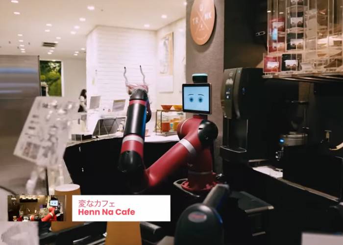 The robot barista at Henn Na Cafe, waiting to make your drink with expectant eyes on its screen.